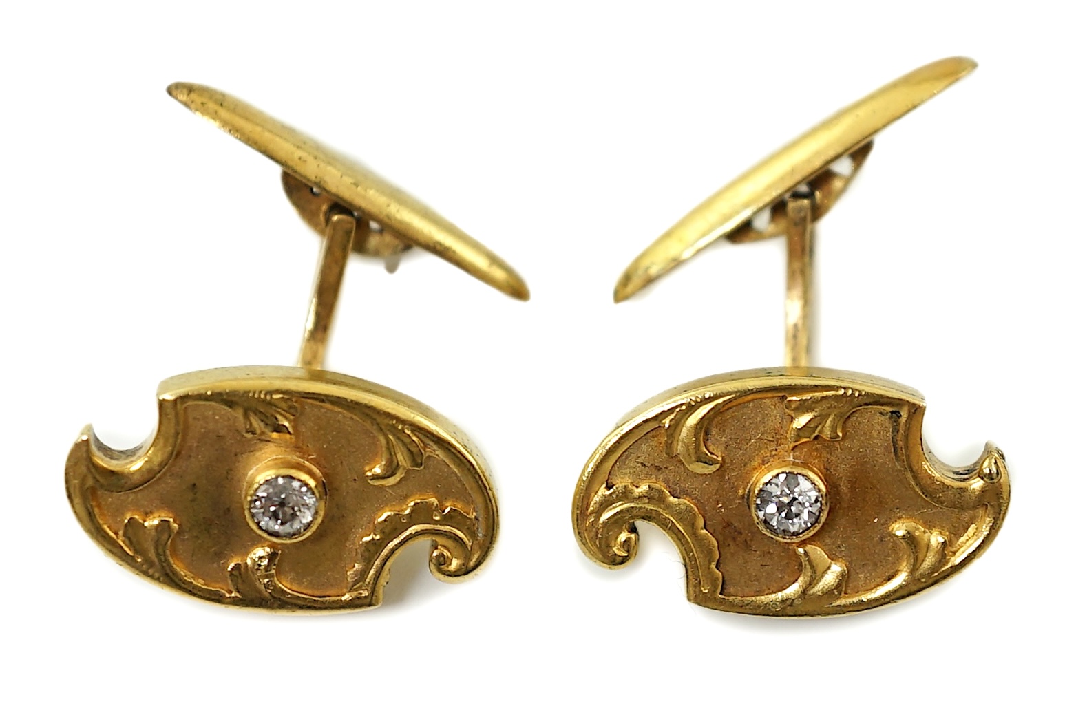 A pair of Russian 56 zolotnik gold and solitaire diamond set cufflinks